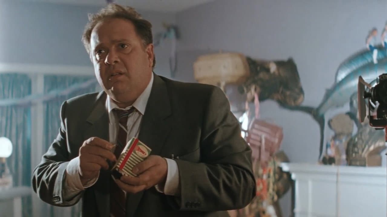 The Adjuster still 8